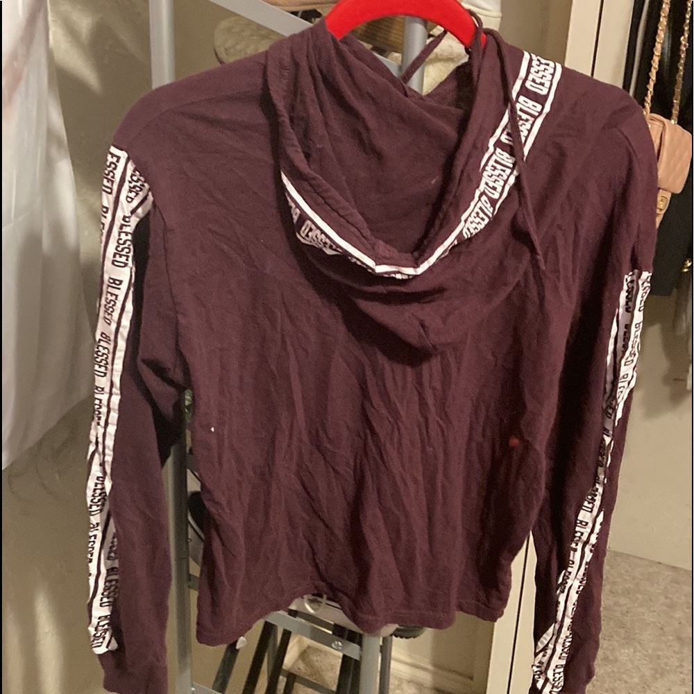 This is a maroon crop top from on fire. It is a XL and very pretty.
